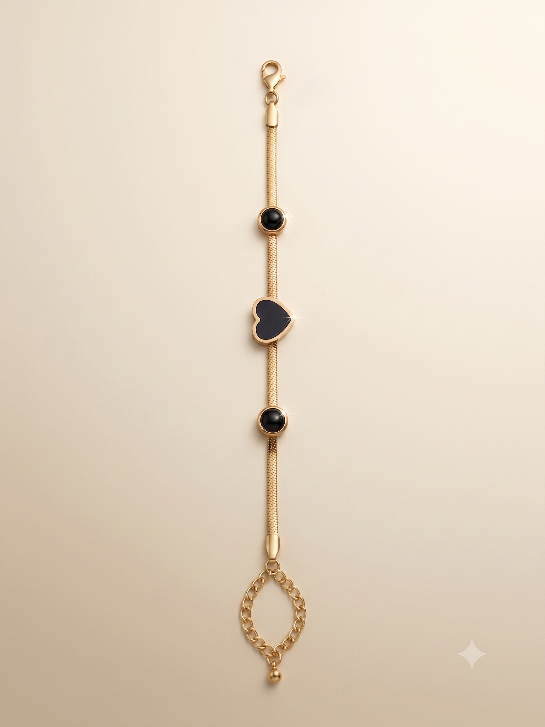 Elegant Gold-Toned Black Heart Station Bracelet