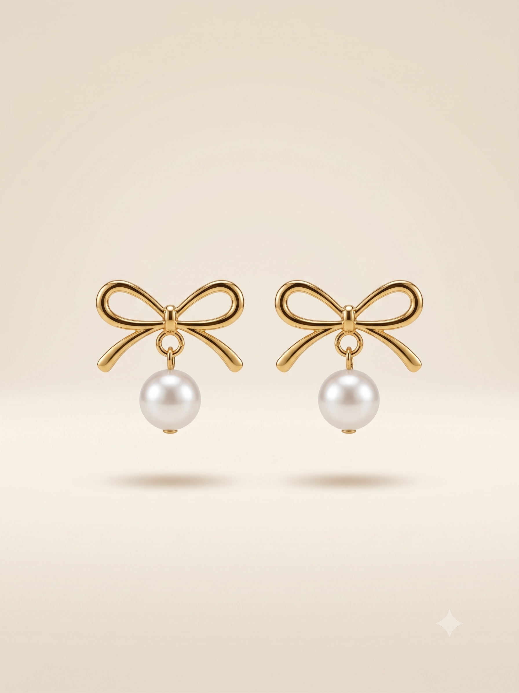 Elegant Gold-Toned Bow Pearl Drop Earrings