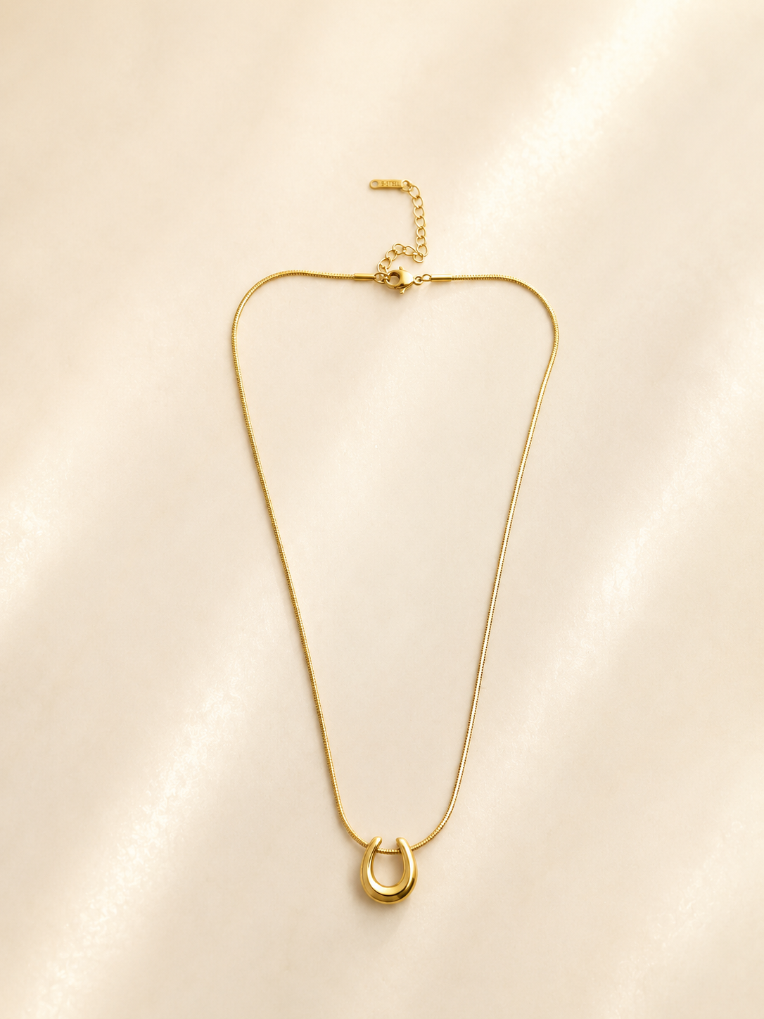 Elegant Gold-Toned Horseshoe Pendant Necklace