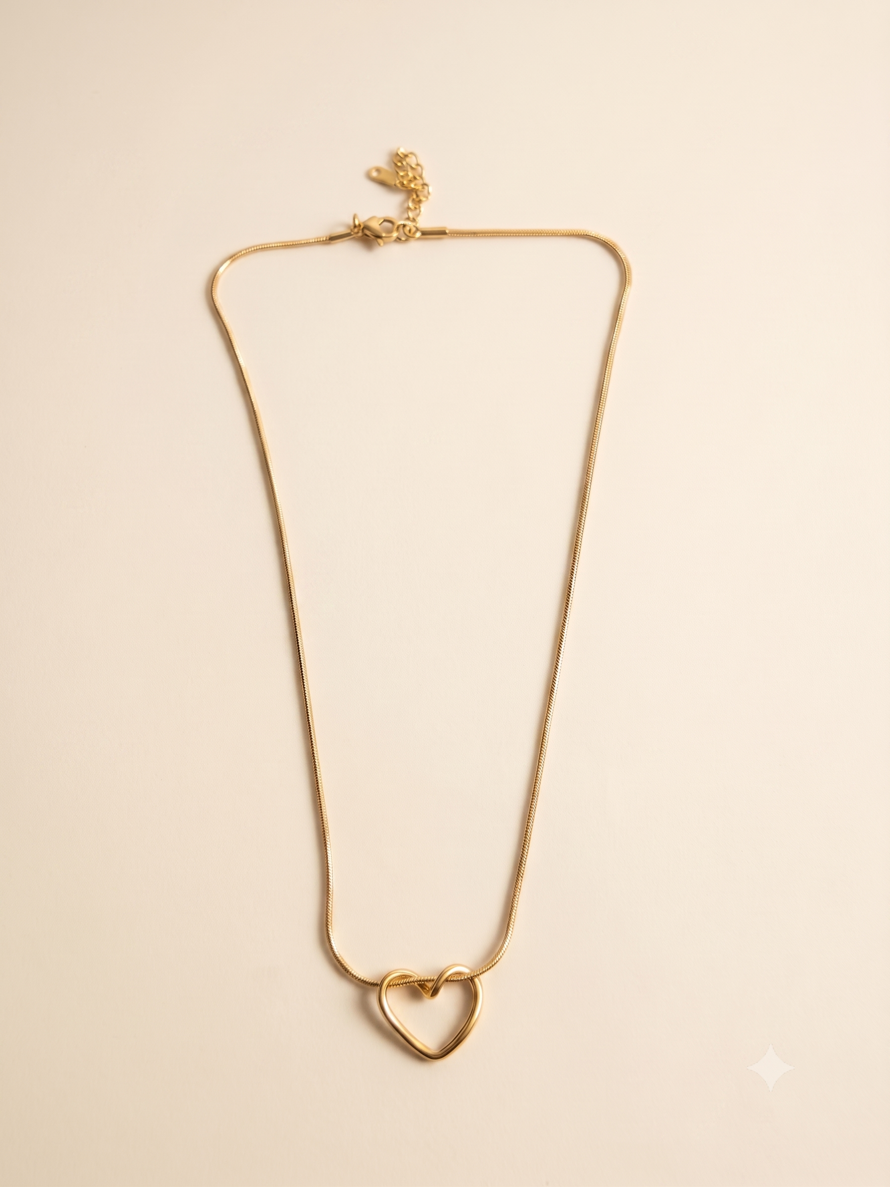 Elegant Gold-Toned Interlocking Heart Pendant Necklace