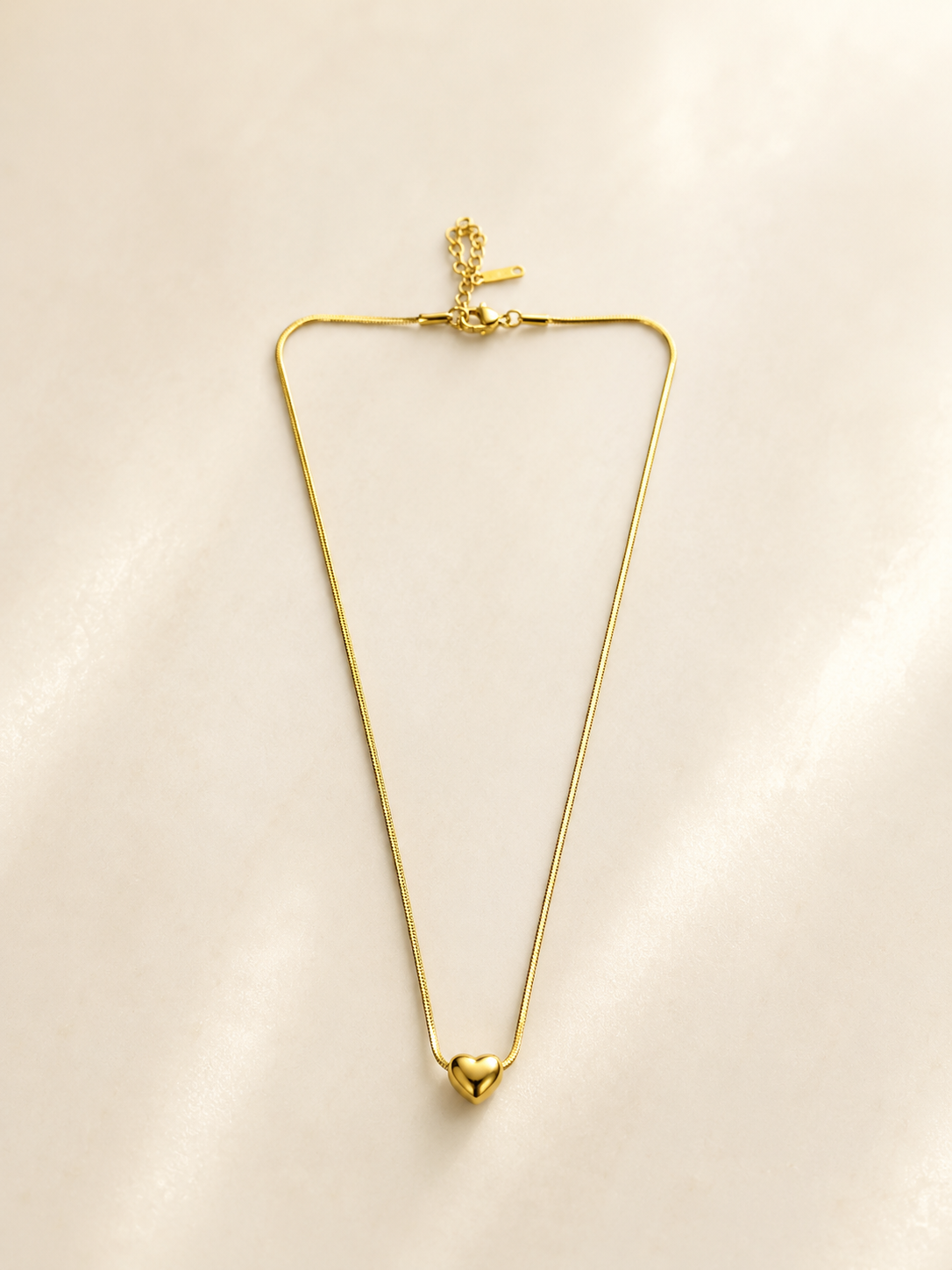 Elegant Gold-Toned Puffed Heart Pendant Necklace