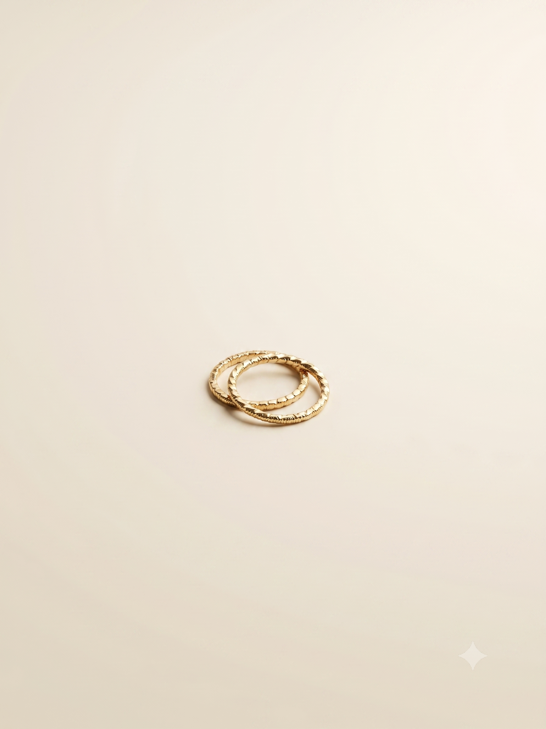 Elegant Textured Gold-Toned Interlocking Rolling Ring