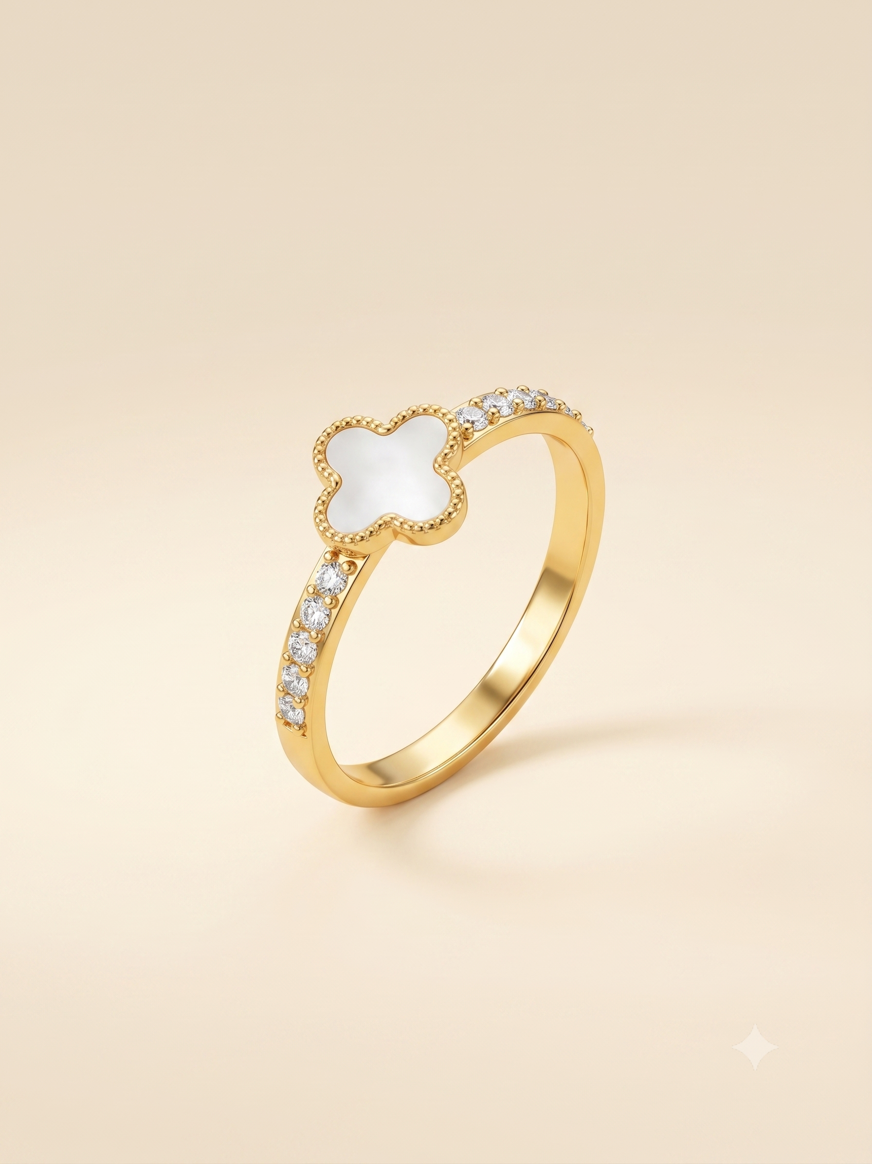 Dainty Gold-Toned Clover Ring with White Inlay and Sparkling Stones